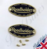 Pair of Norton Roadholder fork badges including fixing rivets.   OEM: 06-7908, 06-7114