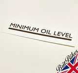Sticker with 'Minimum Oil Level' text and a British flag logo on a white background