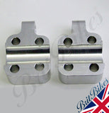 A Pair of Billet Alloy Fork Bottom Caps for Triumph T140, TR7, T160 models with mudguard lug (1973-), with Disc Hub front forks.